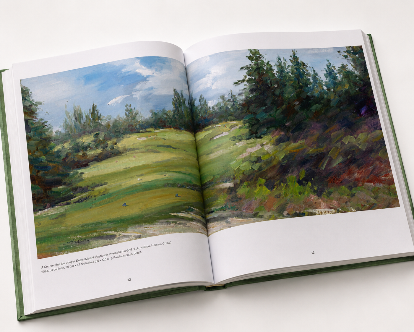 Open book spread with Hudson Zhang golf landscape painting
